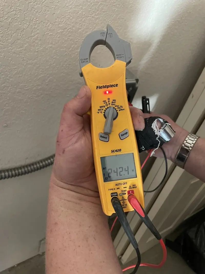 Voltage testing with clamp meter during Electrical Installation Services in Red Lion